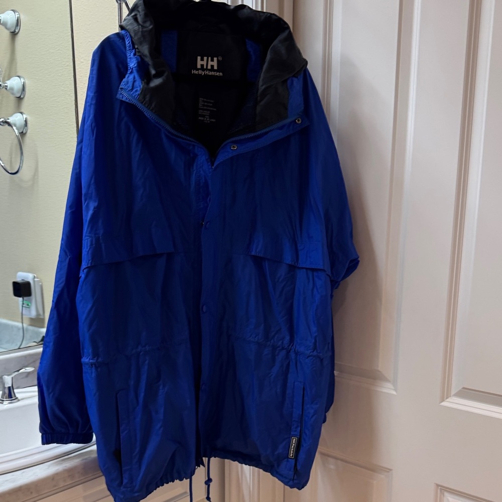 Helly Hansen Men's Vibrant Blue Ski Jacket for layering for on the slopes